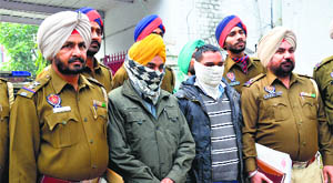 The accused, Angrez Singh and Bachitter Singh, in police custody.