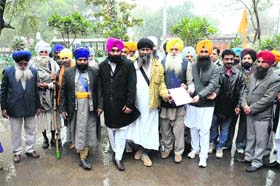 Members of Sikh bodies outside the District Administrative Complex while on their way to submit a memorandum to Naib Tehsildar Subhash Mittal for releasing Sikh detainees in Bathinda on Wednesday