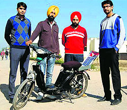 Students with the solar bicycle in Mohali