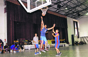 A match in progress in the Uttarakhand State Basketball Championship at Welham Boys School in Dehradun on Wednesday.