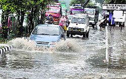 The flooding of roads due to continuous rain poses problems for commuters in Jammu on Wednesday