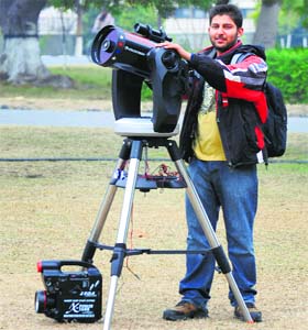 Christ Pal Singh with his telescope in Ludhiana