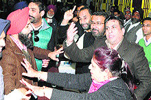 Akali and BJP councillors exchange heated arguments during the MC House meeting at corporation office in Amritsar on Thursday