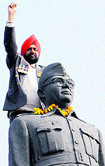 A member of the Azad Hind Fauj Association pays tributes to Netaji Subhas Chandra Bose on his birth anniversary in Amritsar on Thursday