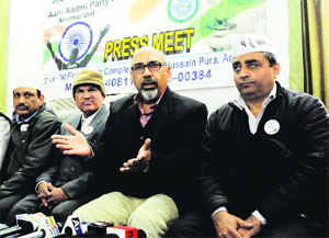 Former DGP Shashikant (second to right) during a press conference in Amritsar on Friday.