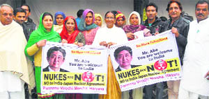 Activists of the Parmanu Virodhi Morcha hold a demonstration against Japanese Prime Minister Shinzo Abes visit to India at Fatehabad on Friday.