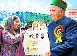 A calendar shows the blurred photograph (in red circle) of Minister for Food and Civil Supplies GS Bali on a bag