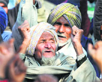 A worker shouts slogans at a mass rally organised by the Centre of Indian Trade Unions at the Mini- Secretariat in Ludhiana on Friday. Tribune Photo: Himanshu Mahajan