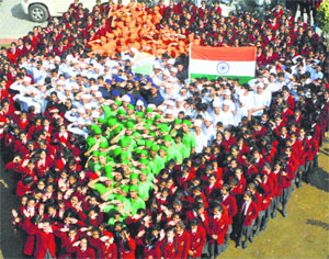 Schoolchildren make a human map of India during a reharsal for the Republic Day celebrations in Patiala on Friday.
