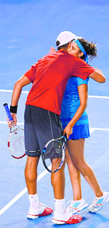 Sania Mirza and her Horia Tecau celebrate after making it to the mixed doubles final