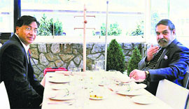Commerce and Industry Minister Anand Sharma in conversation with Arcelor Mittal chief Lakshmi Mittal at the World Economic Forum, Davos, in Switzerland on Friday.