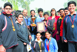 Winners with medals at the Sports Complex, Sector 7, Chandigarh, on Saturday. Tribune photo: Manoj Mahajan