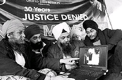 Sikh activists with a photo of death row convict Devinder Pal Singh Bhullar, welcoming the SC order that those mentally not stable cannot be executed