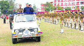 Chief Minister Virbhadra Singh inspects a parade on the 44th Himachal Statehood Day at Dehra on Saturday.
