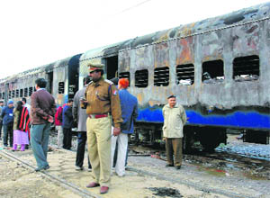 The damaged coaches of the Samjhauta Express after the blasts on February 19, 2007.