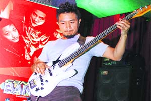 Joshua, who left his job as a teacher to pursue music, performs during one of the concerts