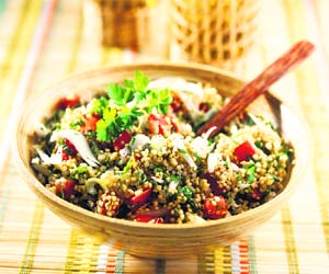 Quinoa is ideal for vegetarians as it contains a balanced set of essential amino acids making it a complete protein source among plant foods