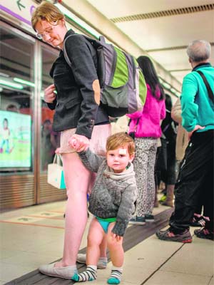 Commuters in Hong Kong braved public transport without trousers. The stunt, also celebrated in Australia's major cities, has gone global since its first staging by the US group Improv Everywhere in New York in 2002