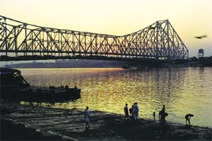The iconic Howrah Bridge is a major landmark of the city