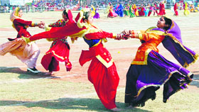 Girls perform gidda during the Republic Day function at Guru Nanak Stadium in Amritsar.