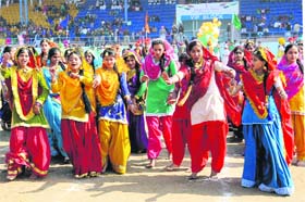 Girls perform giddha during the Republic Day celebrations at the Multipurpose Sports Stadium in Bathinda on Sunday