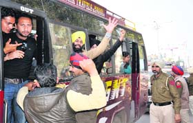 Police round up guest faculty lecturers who tried to block traffic in Bathinda on Monday