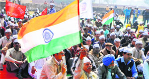 Supporters of the Aam Aadmi Party at the rally ground in Chandigarh on Sunday.
