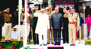 Governor Jagannath Pahadia takes the salute at the Republic Day parade in Gurgaon on Sunday.