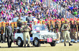 Governor NN Vohra inspects the Republic Day parade at the Maulana Azad Stadium in Jammu on Monday