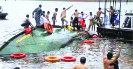 Rescuers search for survivors at Andaman and Nicobar Islands on Sunday.
