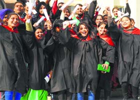 Over to next battle: Students in a jubilant mood after receiving degrees at the convocation of Government Mohindra College in Patiala on Monday