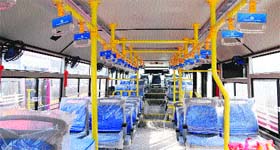 An inside view of a city bus