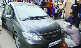 One of the three cars used in the crime was found abandoned near Sewa Nagar railway station in New Delhi on Tuesday
