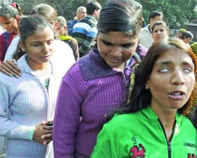 The visually challenged take part in a demonstration outside the Ministry of Social Justice and Empowerment, Shastri Bhawan, to protest against the passing of the Bills on the rights of persons with disabilities in the present form in New Delhi on Tuesday