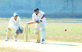 A player hits a shot during the Inter-School Cricket Tournament for the Coca-Cola Cup at Nankana Sahib Public School in Ludhiana on Tuesday.