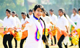Students tap feet during an athletics meet at GCG College in Ludhiana.
