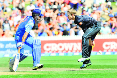 MS Dhoni reaches for the crease as the ball goes through the legs of New Zealands Kane Williamson during their fourth ODI match in Hamilton on Tuesday.
