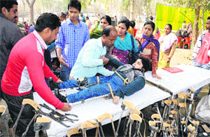 A special child is being given medical aides at a camp under the IED programme of the Sarva Sikhya Abhiyaan in Bathinda on Wednesday.