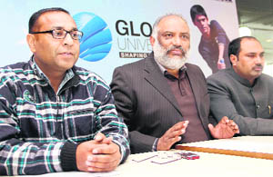 Office-bearers of the District Cricket Association address mediapersons in Dehradun on Tuesday. 