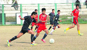 A match being played in the District under-19 Football Tournament at Pavillion Grounds in Dehradun on Tuesday.