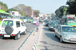 The busy road from Bikram Chowk to the University of Jammu will remain closed for vehicular traffic for five days. Tribune photo: Anand Sharma