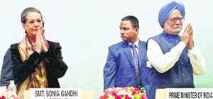 PM Manmohan Singh with UPA chairperson Sonia Gandhi at the inauguration of National Waqf Development Corporation in New Delhi on Wednesday. 