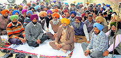 Didar Singh Bhatti, former SAD MLA, with striking patwaris in front of the DCs office in Fatehgarh Sahib on Wednesday