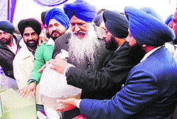 Minister for Animal Husbandry, Fisheries and Dairy Development Gulzar Singh Ranike during a state-level function to distribute semen straws at Chatiwind village, near Amritsar, on Thursday