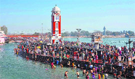 Devotees take a holy dip in the Ganga on 'Mauni Amawasya' in Haridwar on Thursday.