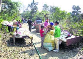 Landslide-affected families take shelter in the open at Katrah village in Jawali subdivision on Wednesday