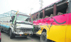 The private bus and the truck that collided on the Pathankot road in Jalandhar on Thursday. A Tribune photograph