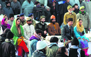 Bollywood actors Tabu and Shraddha Kapoor along with the locals during the shooting of Haider in Anantnag on Thursday.