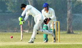 A batsman plays a cover drive during an inter-school match for the Coca-Cola Cricket Cup at SCD Government College in Ludhiana on Thursday