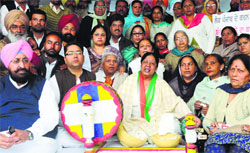 PPCC president Partap Singh Bajwa and Mahila Congress chief Malti Thapar (right) with party workers at a relay fast in Chandigarh on Thursday. Tribune photo: Manoj Mahajan